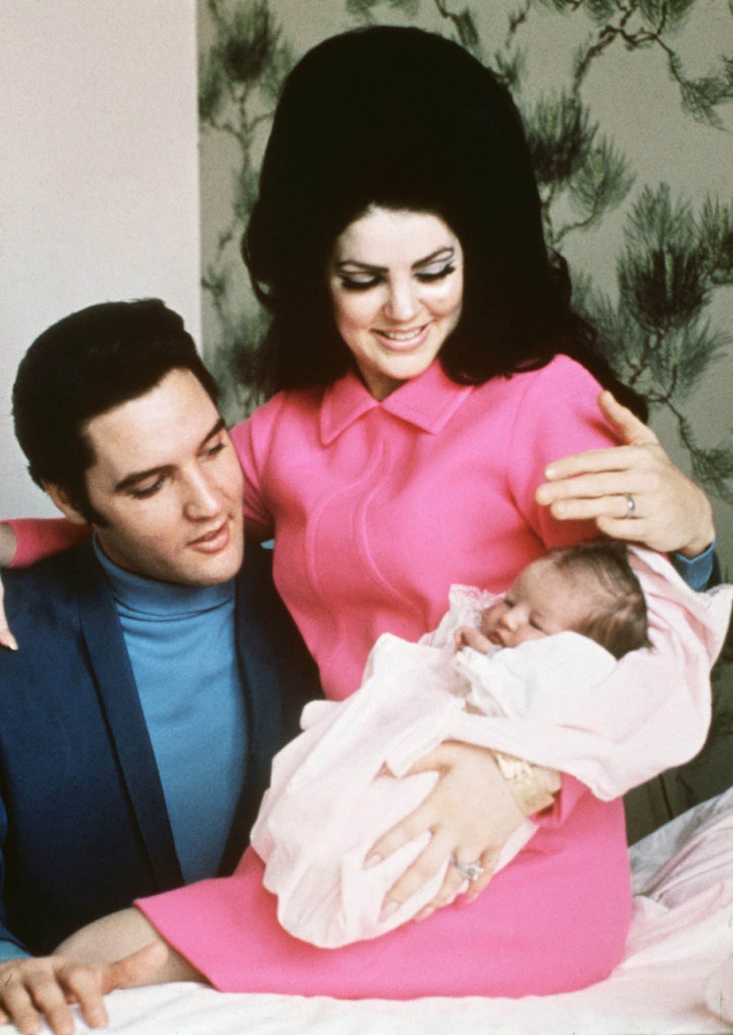 Elvis Presley and his wife, Priscilla, prepare to leave the hospital with their new daughter, Lisa Marie Presley. Memphis, Tennessee, February 5, 1968.