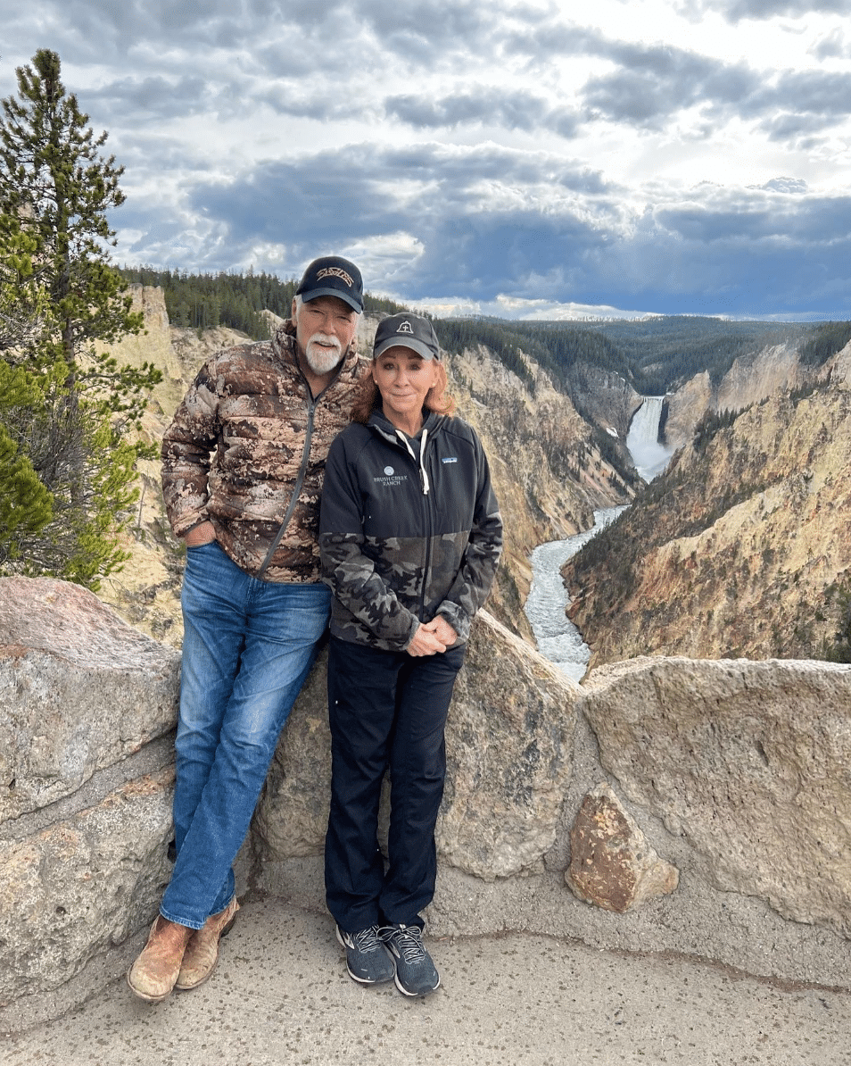 Reba and Rex pose for a photo at Yellowstone National Park.