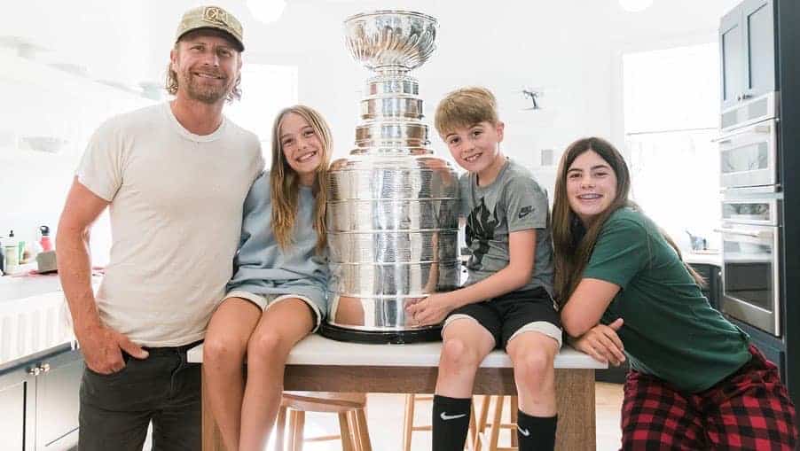 Dierks Bentley and his two daughters and son at home with the Stanley Cup.