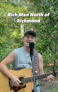 Photo of Dylan Carter singing "Rich Men North of Richmond."