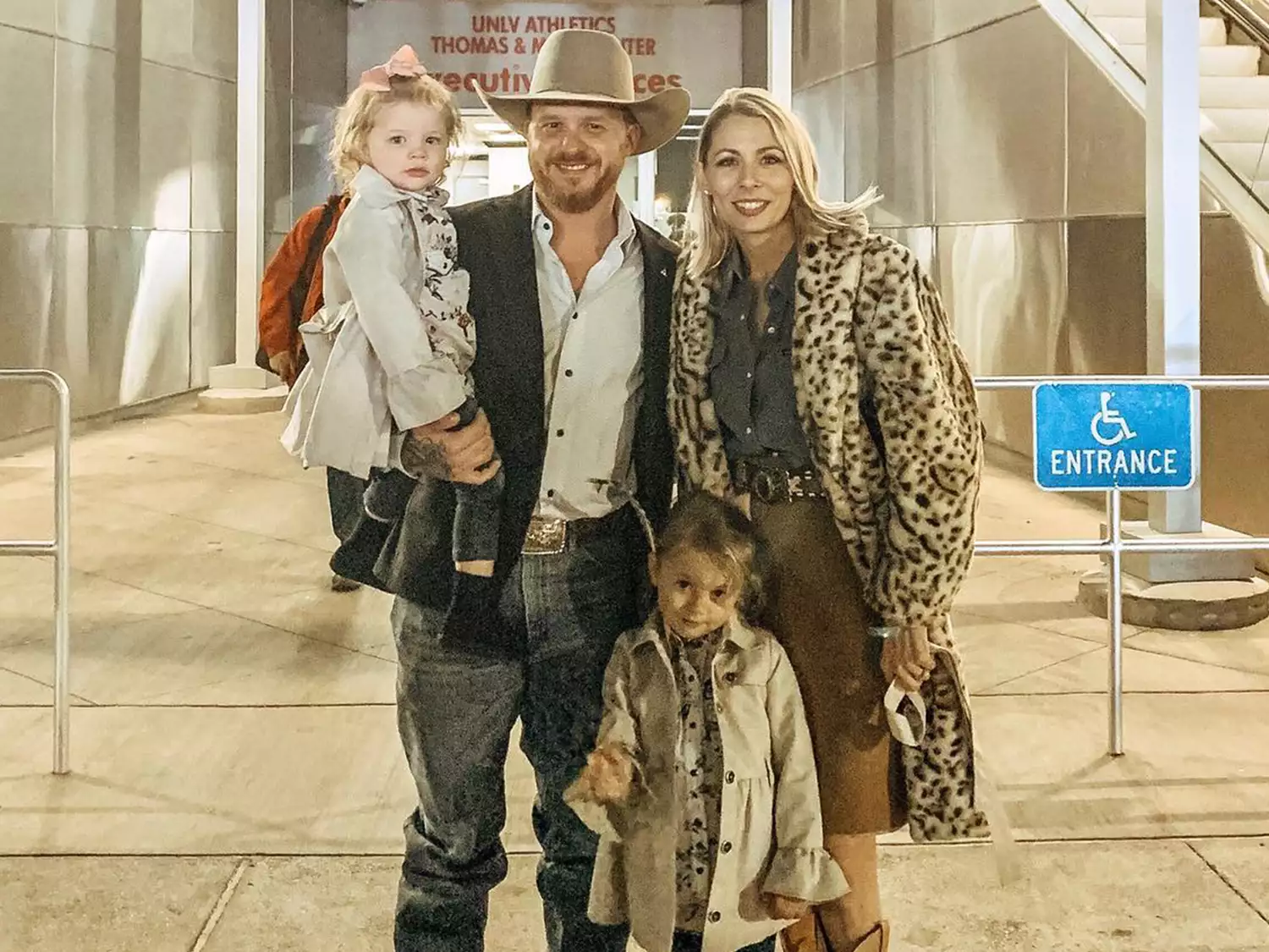 Cody Johnson with his wife Brandi and their two daughters