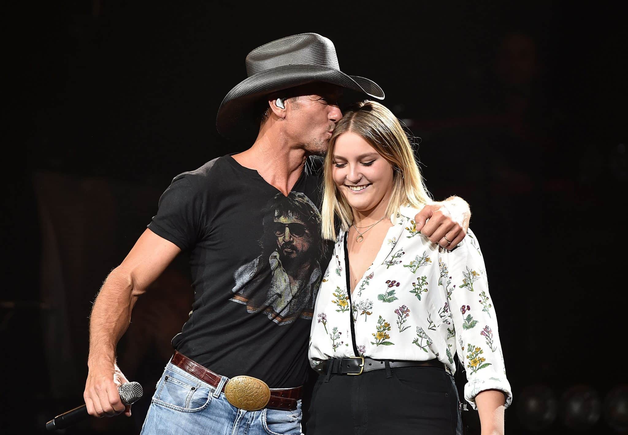 NASHVILLE, TN - AUGUST 15: Musician Tim McGraw, left, performs with his daughter Gracie McGraw on the "Shotgun Rider" tour at Bridgestone Arena on August 15, 2015 in Nashville, Tennessee. (Photo by John Shearer/Getty Images for Big Machine Records)