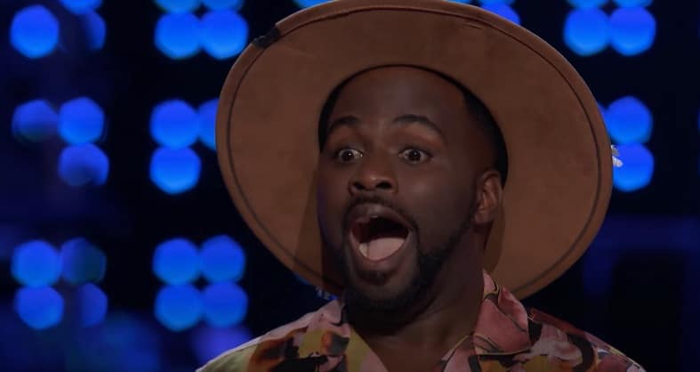 Reba McEntire used her only "Voice" playoff pass after a country-themed battle. Here, Tae Lewis reacts to first being named the winner of the battle.