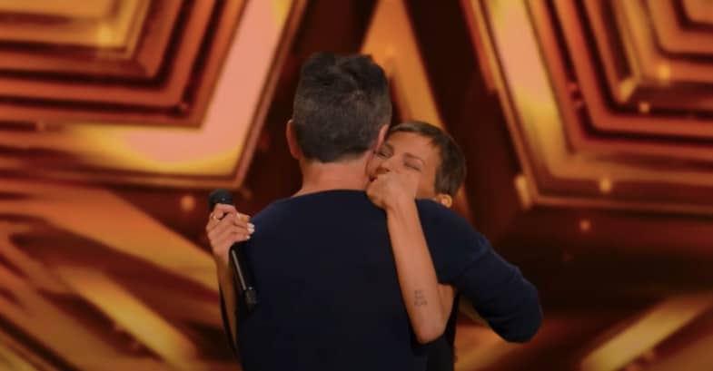 Simon Cowell hugs AGT Golden Buzzer recipient Nightbirde
