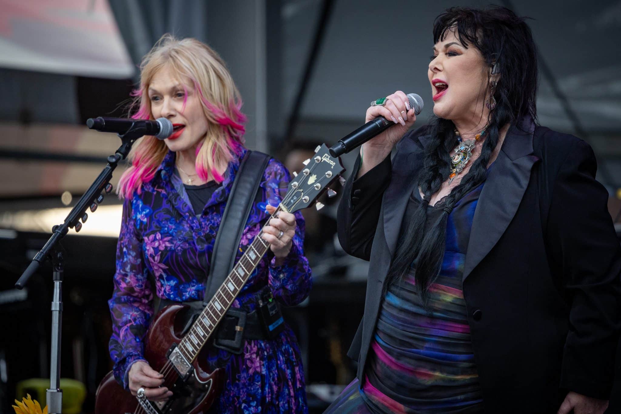 NEW ORLEANS, LOUISIANA - APRIL 28: (L-R) Nancy Wilson and Ann Wilson of Heart perform during day 4 of the New Orleans Jazz & Heritage Festival 2024 at Fair Grounds Race Course on April 28, 2024 in New Orleans, Louisiana. (Photo by Douglas Mason/WireImage)