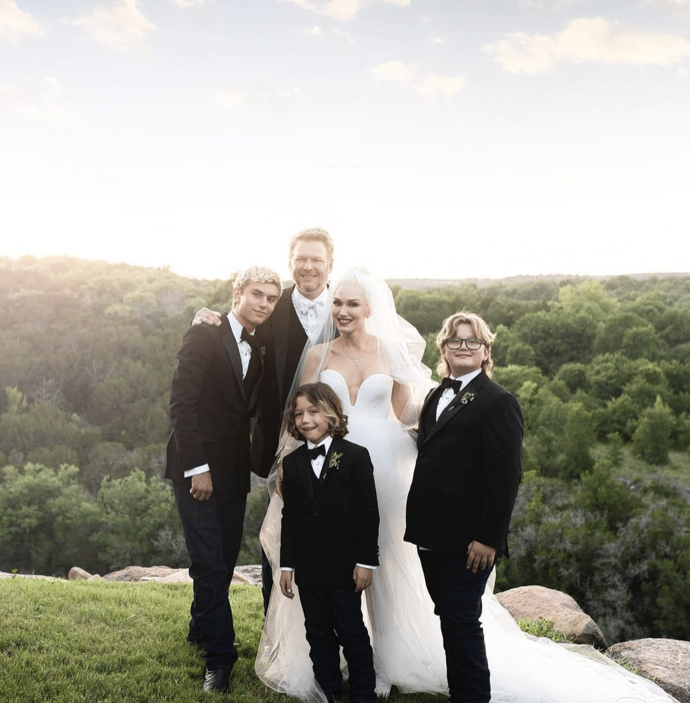 Blake Shelton and Gwen Stefani with her three sons on their wedding day.