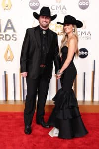 Devlin Hodges and Lainey Wilson at The 57th Annual CMA Awards at Bridgestone Arena 