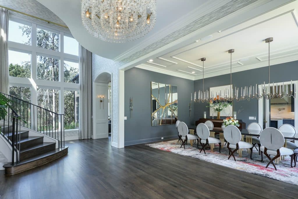 Dining room with sweeping staircase