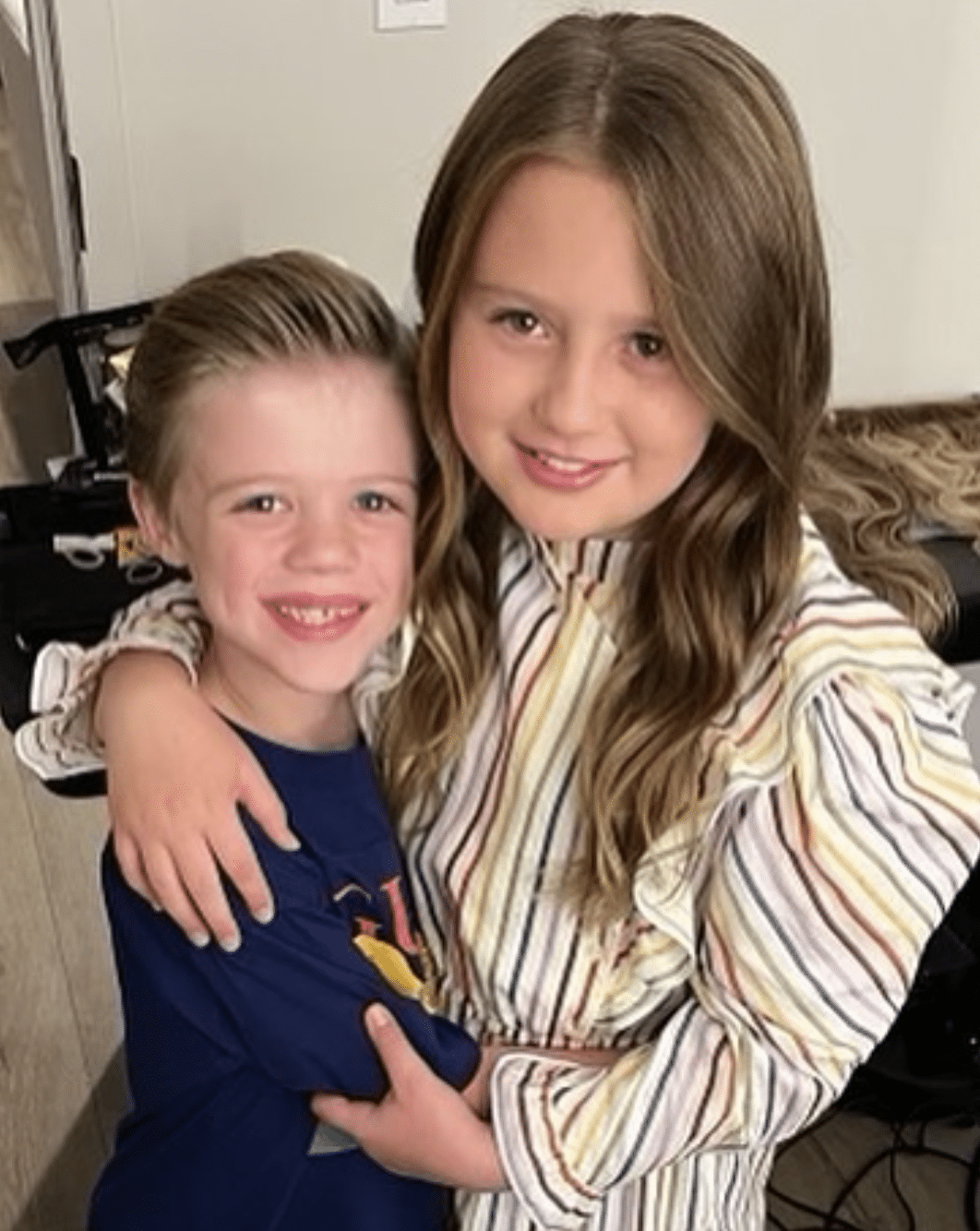 Kelly Clarkson's kids, Remy and River, smile for a picture backstage at her Las Vegas residency