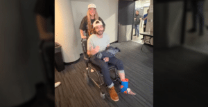 Thomas Rhett in a wheelchair after breaking his ankle
