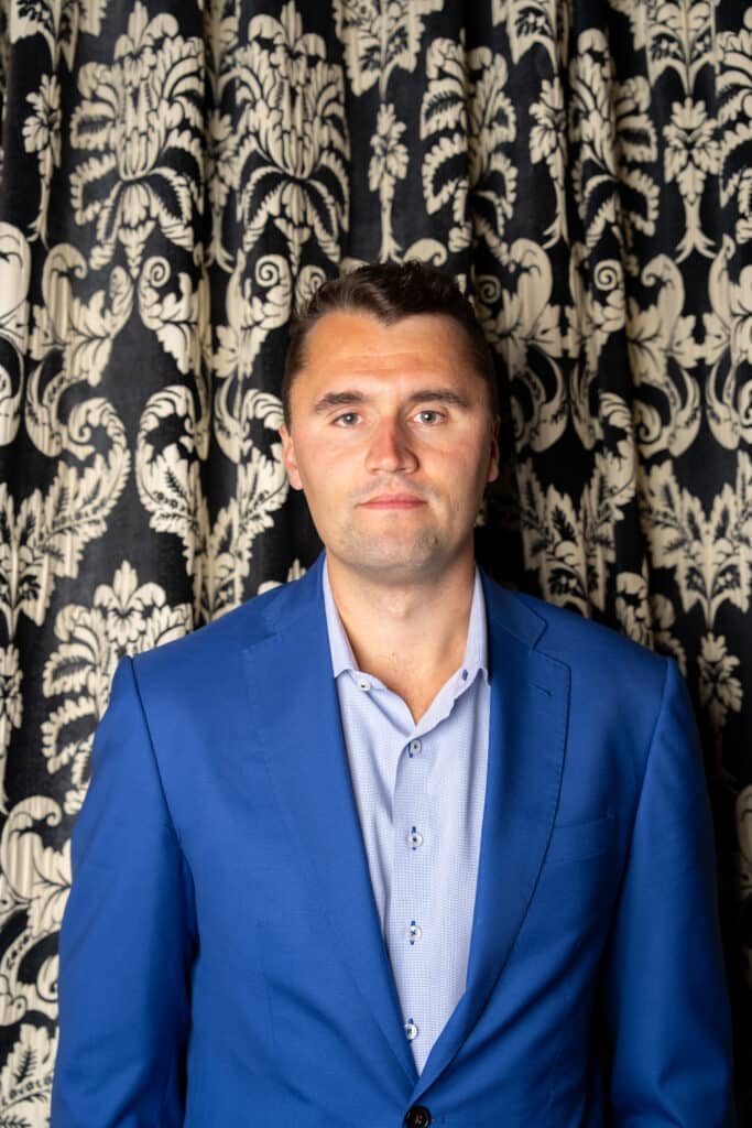 Charlie Kirk portrait in blue suit