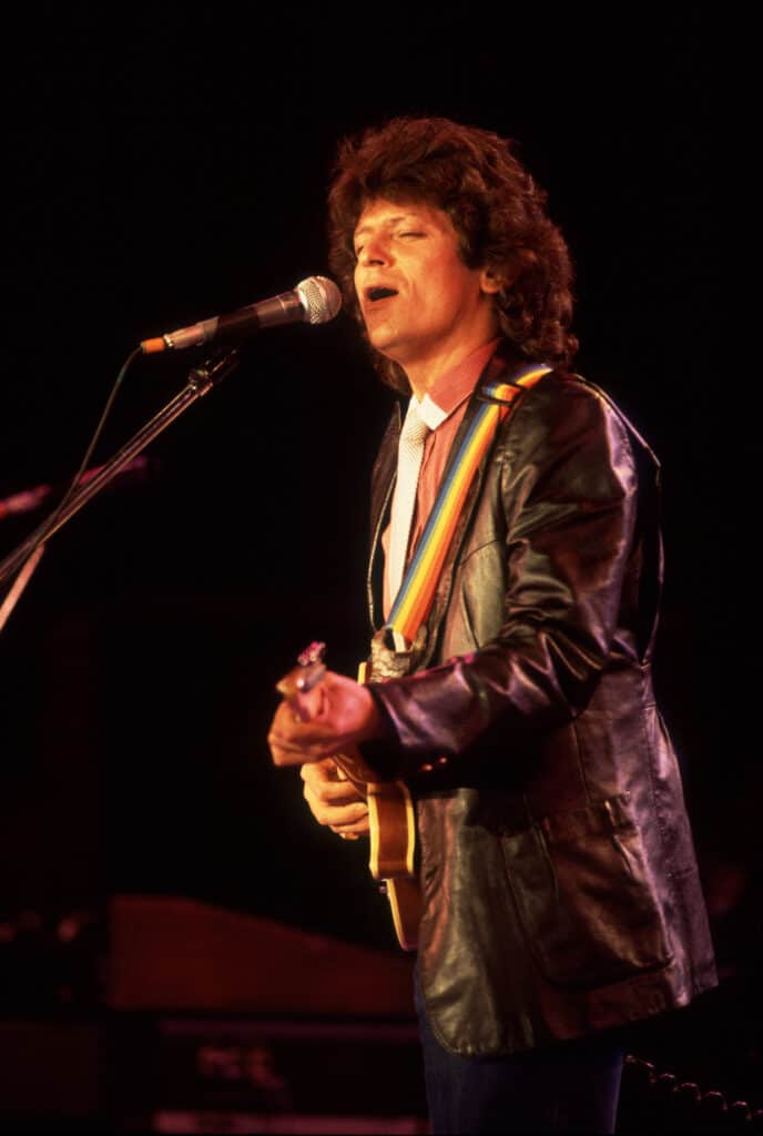 Country singer Johnny Rodriguez performing onstage in 1986