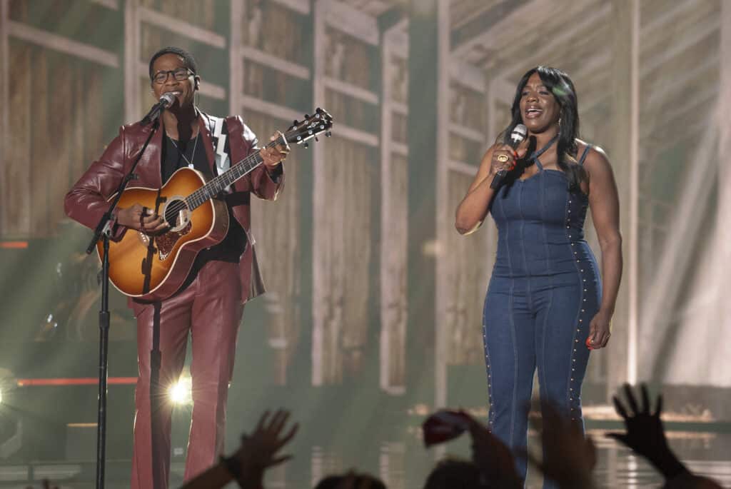 Thunderstorm Artis sings with Tanya Trotter of the War and Treaty during the American Idol finale