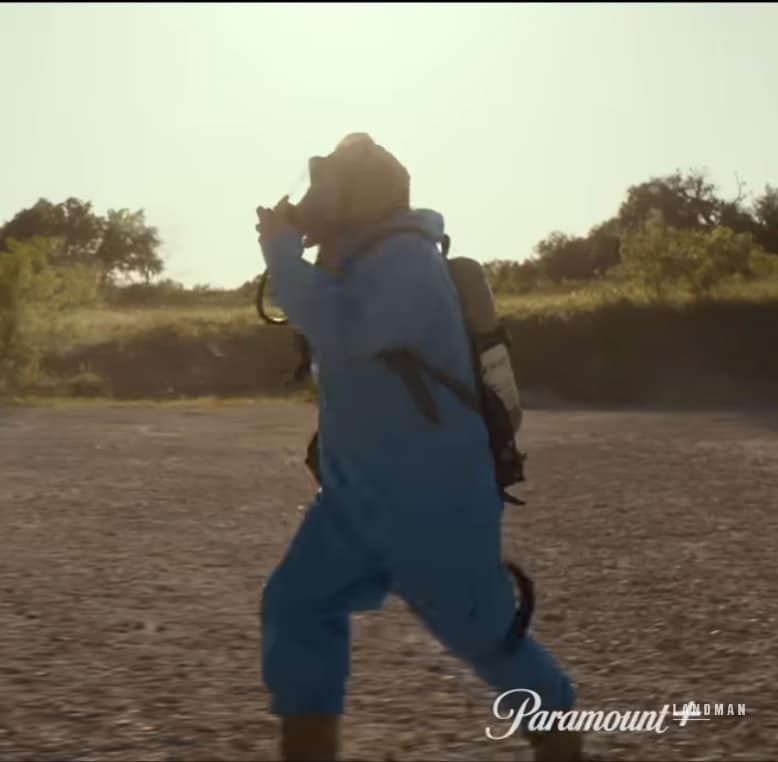 Dale runs in his hazmat suit to try and save a laborer