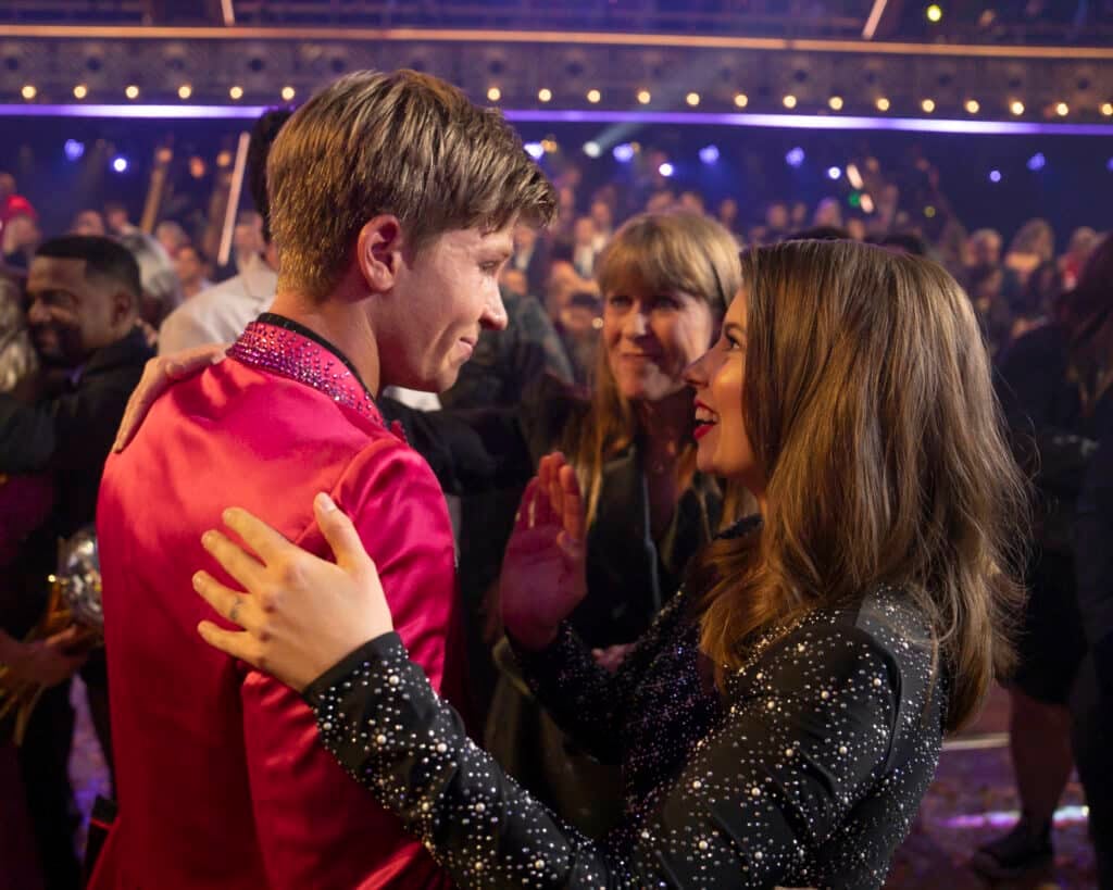 Robert Irwin is congratulated by his sister Bindi, while their mom Terri looks on, after he won Dancing with the Stars