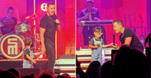 Scotty McCreery on stage with his song Avery