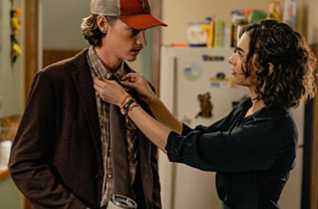 Ariana fixes Cooper's tie before they go to his grandma's funeral