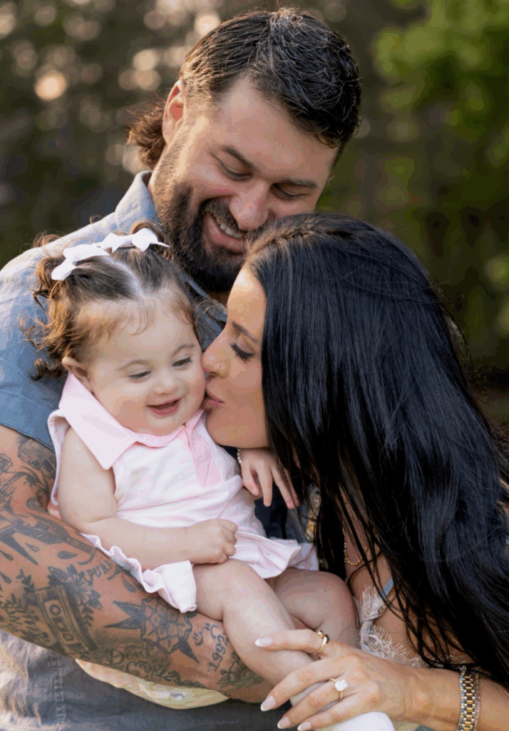 Koe Wetzel and Bailey Fisher celebrate their engagement with their daughter, Woods.